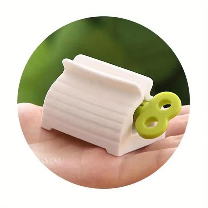 1 Pc Rolling Tube Toothpaste Squeezer Toothpaste Seat Holder Stand Rotate Toothpaste Dispenser for Bathroom