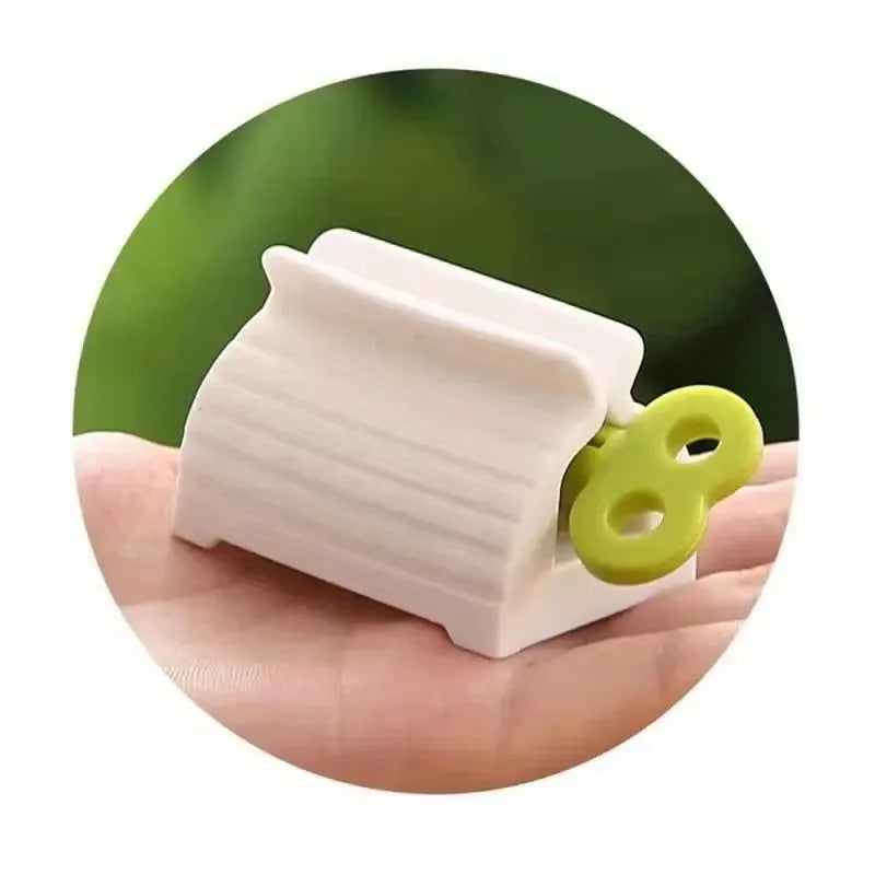 1 Pc Rolling Tube Toothpaste Squeezer Toothpaste Seat Holder Stand Rotate Toothpaste Dispenser for Bathroom